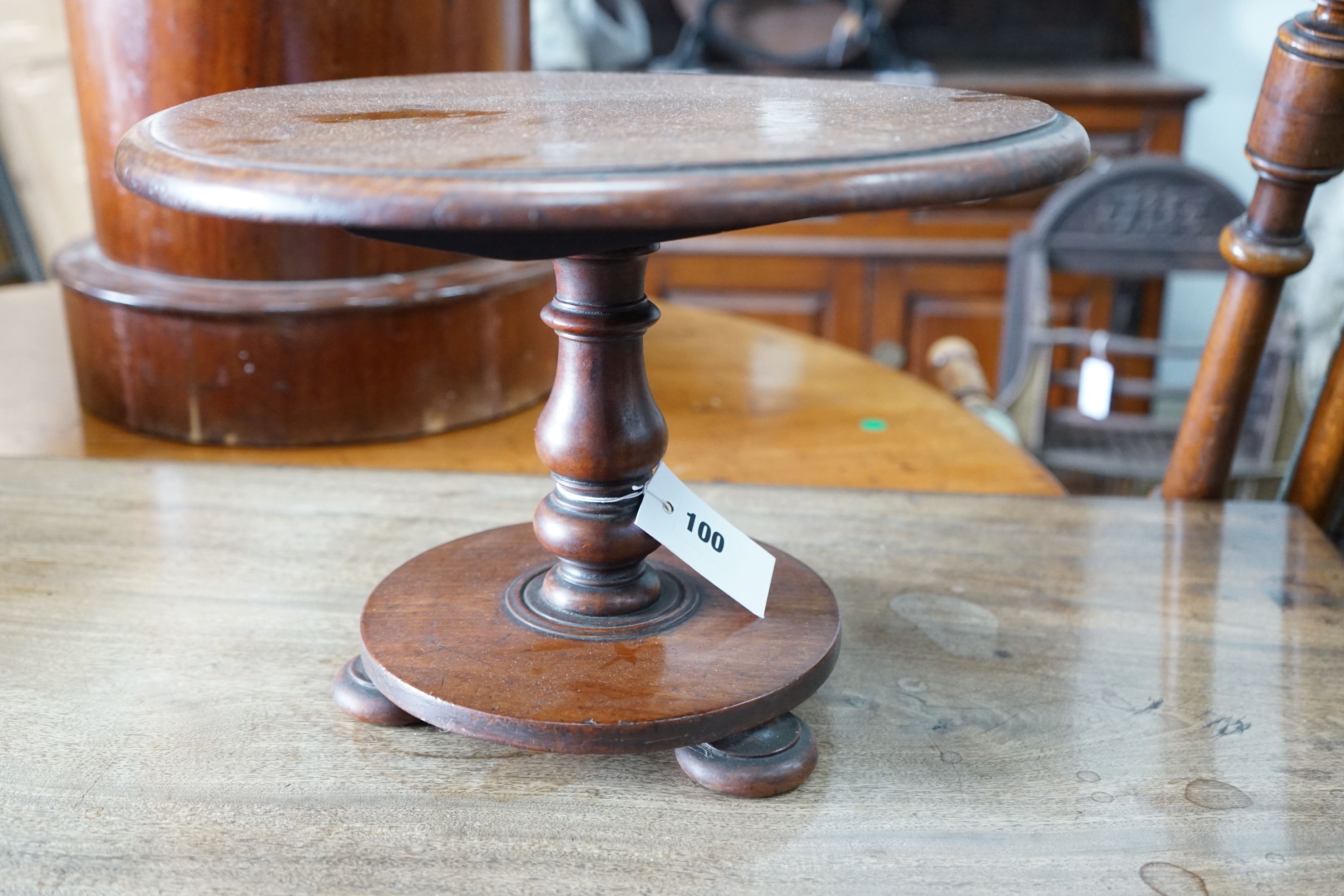 A Victorian miniature mahogany tilt top breakfast table, diameter 35cm, height 24cm